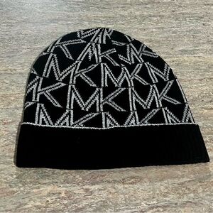 NWOT Michael Kors black and white MK knit hat. Unisex